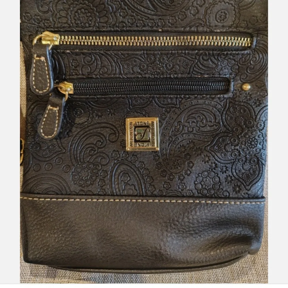 Stone Mountain Accessories Black tooled leather Crossbody Bag